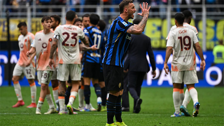 Inter downed by Roma, McTominay fires Napoli to top of Serie A