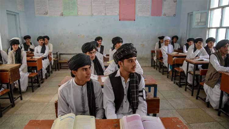 Tunics & turbans: Afghan students don Taliban-imposed uniforms