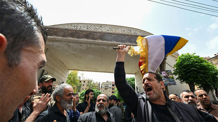 Syria reports Israeli strikes as clashes with Druze spread