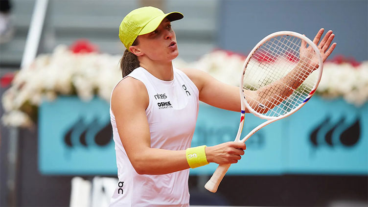 Swiatek recovers against Keys to reach Madrid Open semis