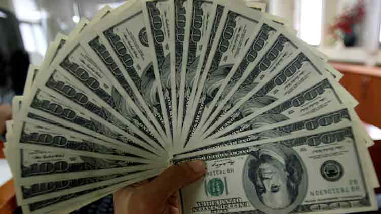 Dollar takes a breather; yen slips after BOJ