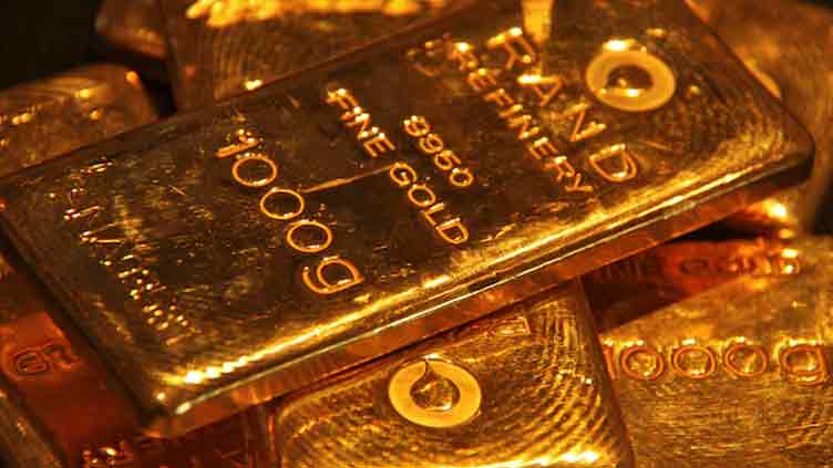 Gold retreats as trade tensions ease; US payrolls data on tap